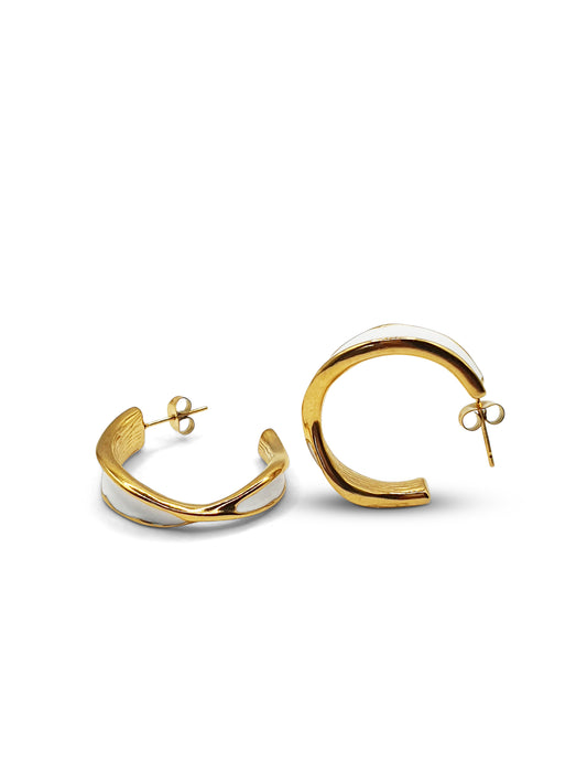 A pair of gold twisted design hoops with white enamel plating and butterfly stud backs
