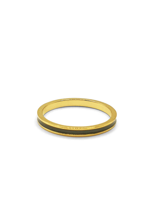 A gold band ring with black enamel banding around the middle