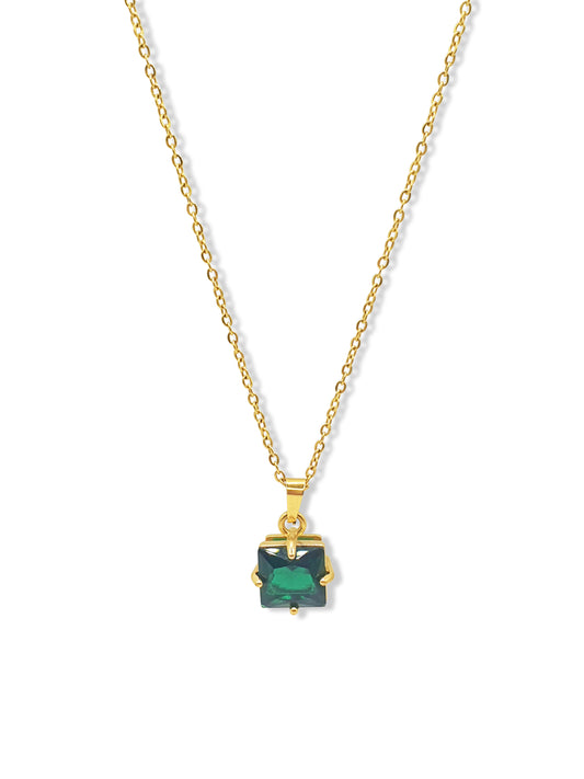 Gold necklace with a dark green square crystal pendant